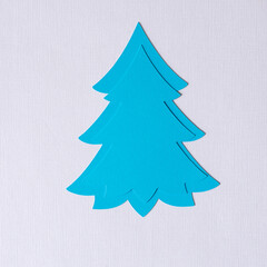 Fototapeta premium holiday paper tree designs on textured paper