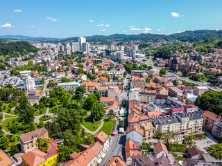 Aerial drone view of city of Tuzla, Bosnia and Herzegovina. Buildings, streets and residential...