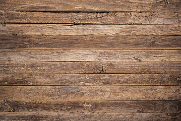 Rustic wood slat background,old and weather cracked wood,close up,copy space.
