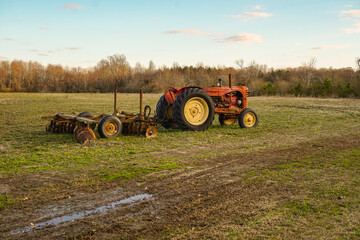 Obraz premium old tractor in field