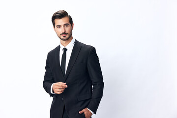 Portrait of a man in an expensive business suit on a white background isolated, copy space. Businessman startup technology