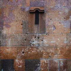 Ancient masonry made of Armenian red tuff. The texture of the wall.
