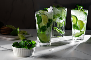 Mojito cocktails on white marble table