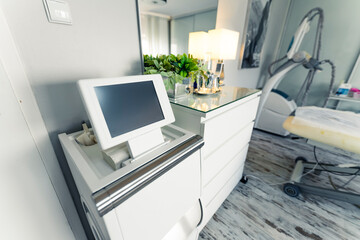 Technology in the field of non-surgical aesthetic medics and skincare. Interior of professional beauty cosmetologist salon. Various equipment. High quality photo