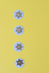 snowflakes made of wood on paper circles