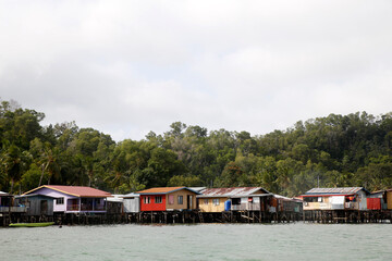 Fototapeta na wymiar Floating houses, Gaya island, Kota Kinabalu, Malaysia