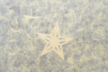 Fototapeta na wymiar tissue paper on wooden star background