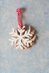 Fototapeta na wymiar wooden holiday snowflake ornaments