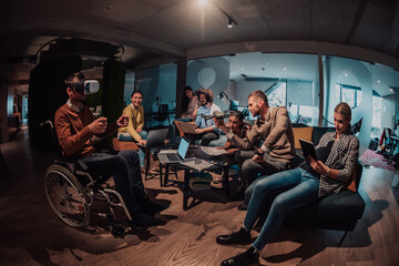 Fototapeta na wymiar Business persons with a disability at work in modern open space coworking office on team meeting using virtual reality goggles.