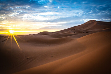 sunrise over sand dunes of erg chebbi, merzouga, morocco, desert, north africa, sahara