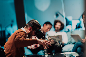 Business persons with a disability at work in modern open space coworking office on team meeting using virtual reality goggles.