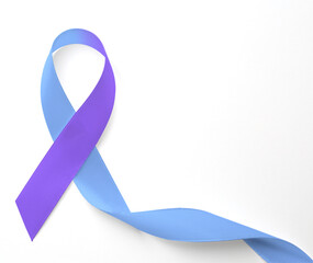 World Arthritis Day. Blue and purple awareness ribbon on white background, top view