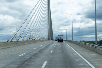 Fototapeta na wymiar bridge over the river with highway road 