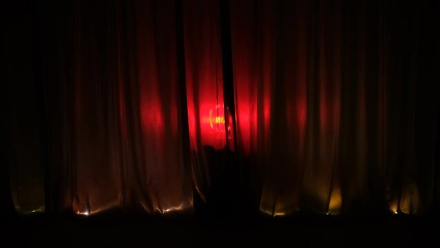 Evil Silhouette of a Woman Standing on red background moving forward and push apart other people. Malicious girl having a selfishe wicked side. Concept of egoistic behavior. Egoism.