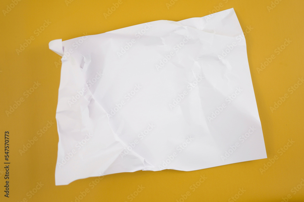 Poster abstract crumpled paper texture isolated in yellow background