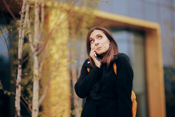 Funny Urban Woman Having a Phone Conversation on the Street. Expressive businesswoman calling the...