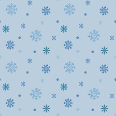 Seamless pattern with hand drawn snowflakes on blue background. Christmas holiday background