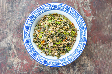 Hunan native vegetables with minced meat and dried plum vegetables
