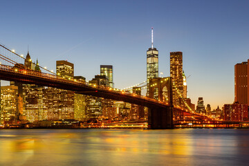 Sunset of the Brooklyn Bridge and New York City skyline