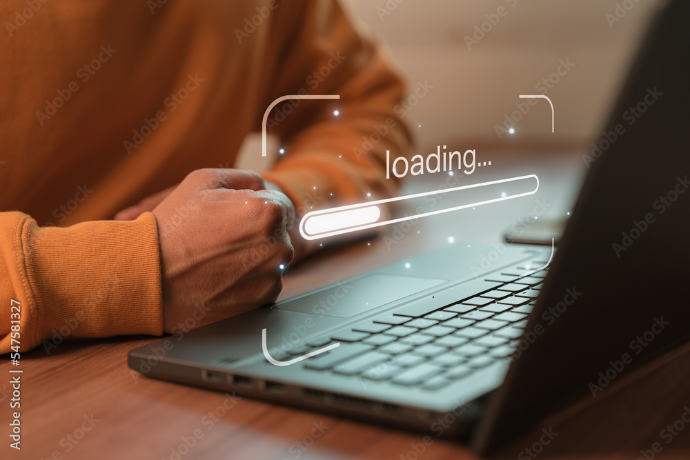 Poster Man using laptop for download software and waiting to loading digital business data form website, concept of waiting for load of loading bar.