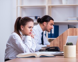 Call center operators working in the office