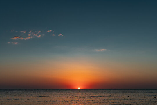 Sunset on sea. Surface on sunset. Water background © grthirteen
