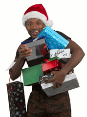 man wearing santa claus hat and holding many christmas gifts boxes isolated on white background