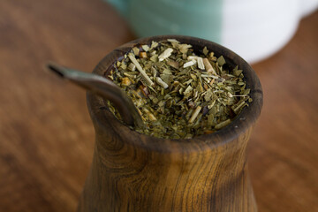Close-up of matero with argentine mate herb. Concept of South American traditions.