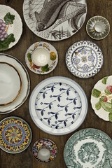 Top shot of various patterned and illustrated plates