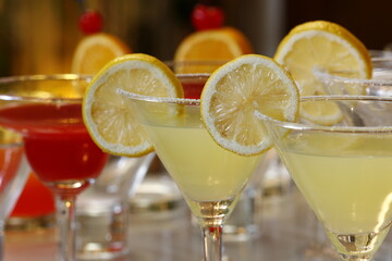 Colorful alcoholic drinks placed in a row