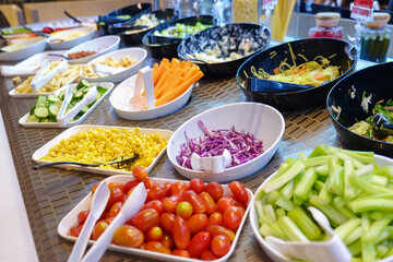 Colorful vegetable with sauce on plate in dinner salad bar healthy food
