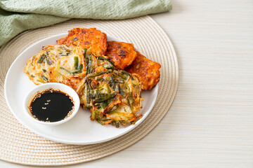 Pajeon or Korean pancake and Korean Kimchi pancake or Kimchijeon on white background