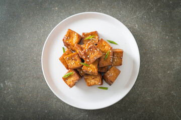 fried tofu with white sesame and teriyaki sauce