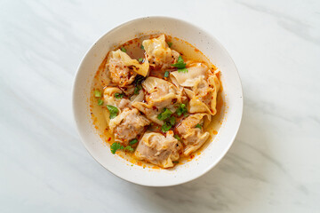 pork wonton soup or pork dumplings soup with roasted chili