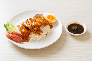 crispy pork on rice with barbecue sauce