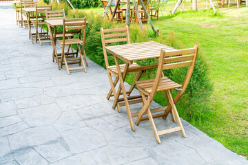 wood table and chair in outdoor coffee shop cafe and restaurant