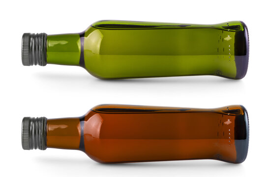 Set Of Lying On The Side Bottle With Olive Oil On White