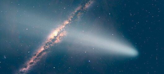 Comet on the space Milky Way galaxy in the background 