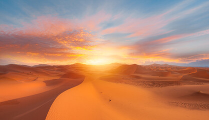 Fototapeta Camel caravan in the desert at sunrise -  Sahara, Morrocco obraz