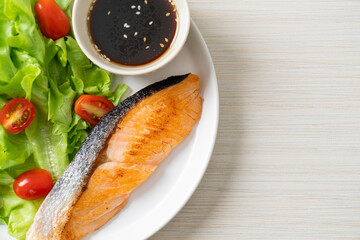 grilled salmon fillet steak with salad