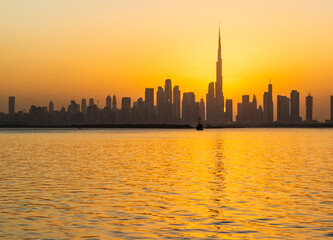 Fototapeta na wymiar Dubai, UAE - 10.07.2022 View of Dubai skyline, shot made from Dubai creek harbor. City