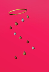 Decorative balls float under the wooden hoop.