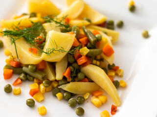 Close up shot of a mixed vegetables on the plate. Food