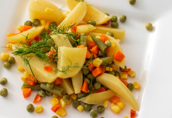 Close up shot of a mixed vegetables on the plate. Food