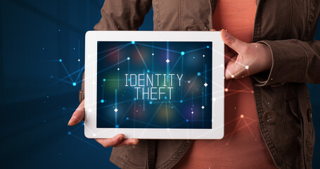 Person holding tablet, security concept