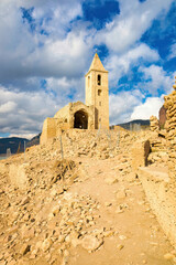 View of the state of the church of Sant Roma of Sau completely uncovered due to climate change drought, autumn 2022. Sau Reservoir, Catalonia, Spain