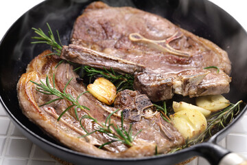 lamb shoulder chop steaks on a skillet © uckyo