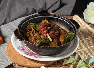 Three cups of preserved eggs served in dish isolated on table top view of chines food