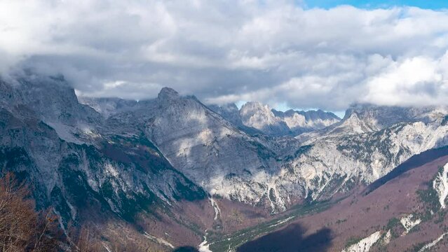 4K time lapse footage from mountains  of theth national park in albania with moving white clouds on sky and dinaric alps