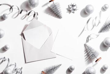 Silver envelope on christmas holiday background